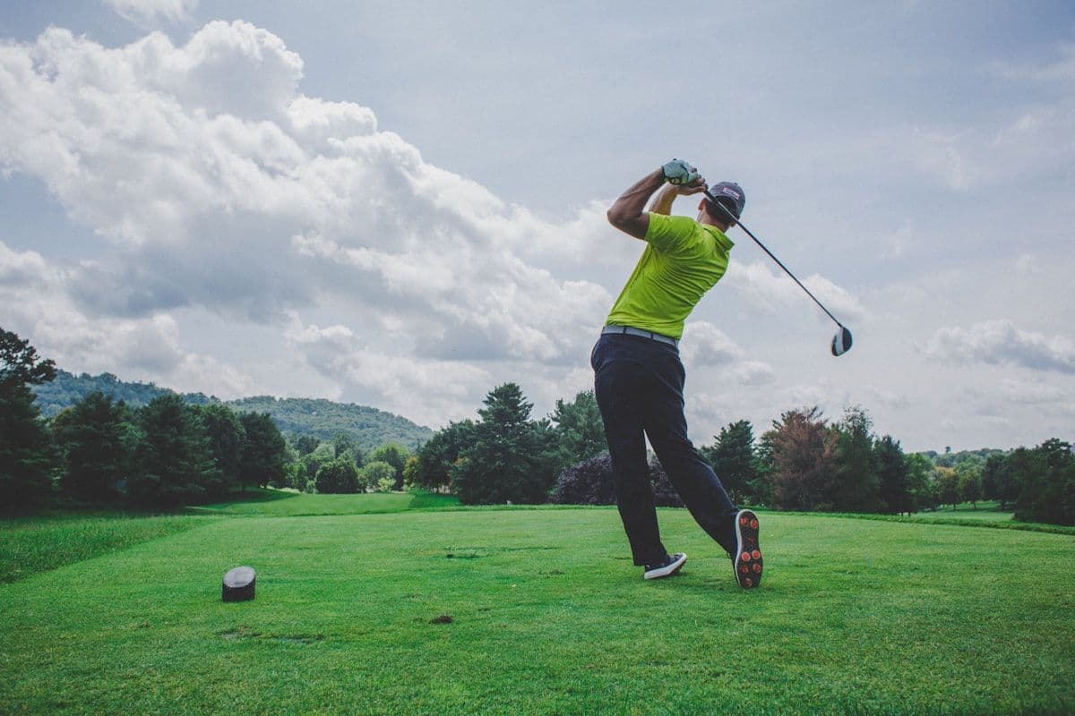 Golf course at golden hour with lush green fairways