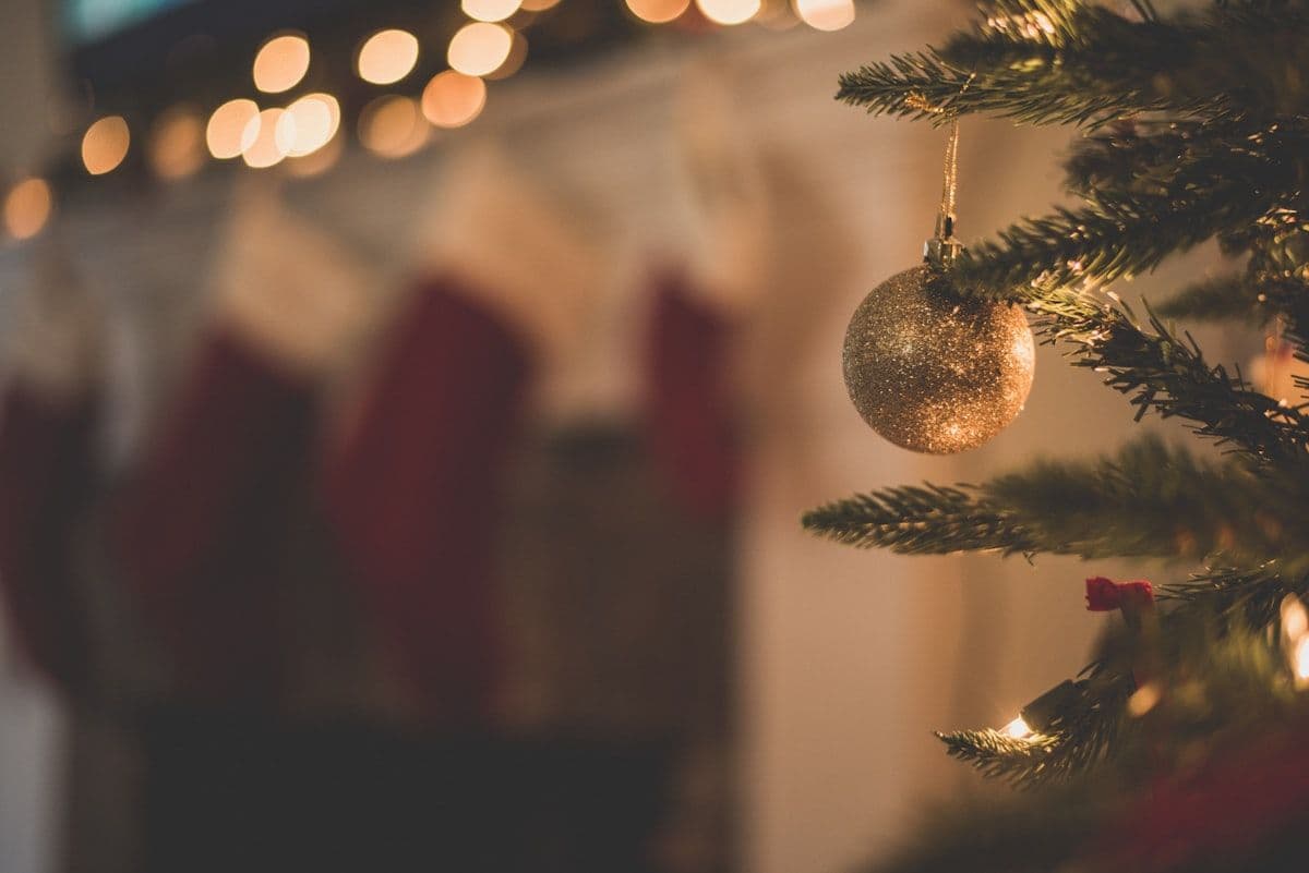 Festive winter holiday scene with warm golden lights
